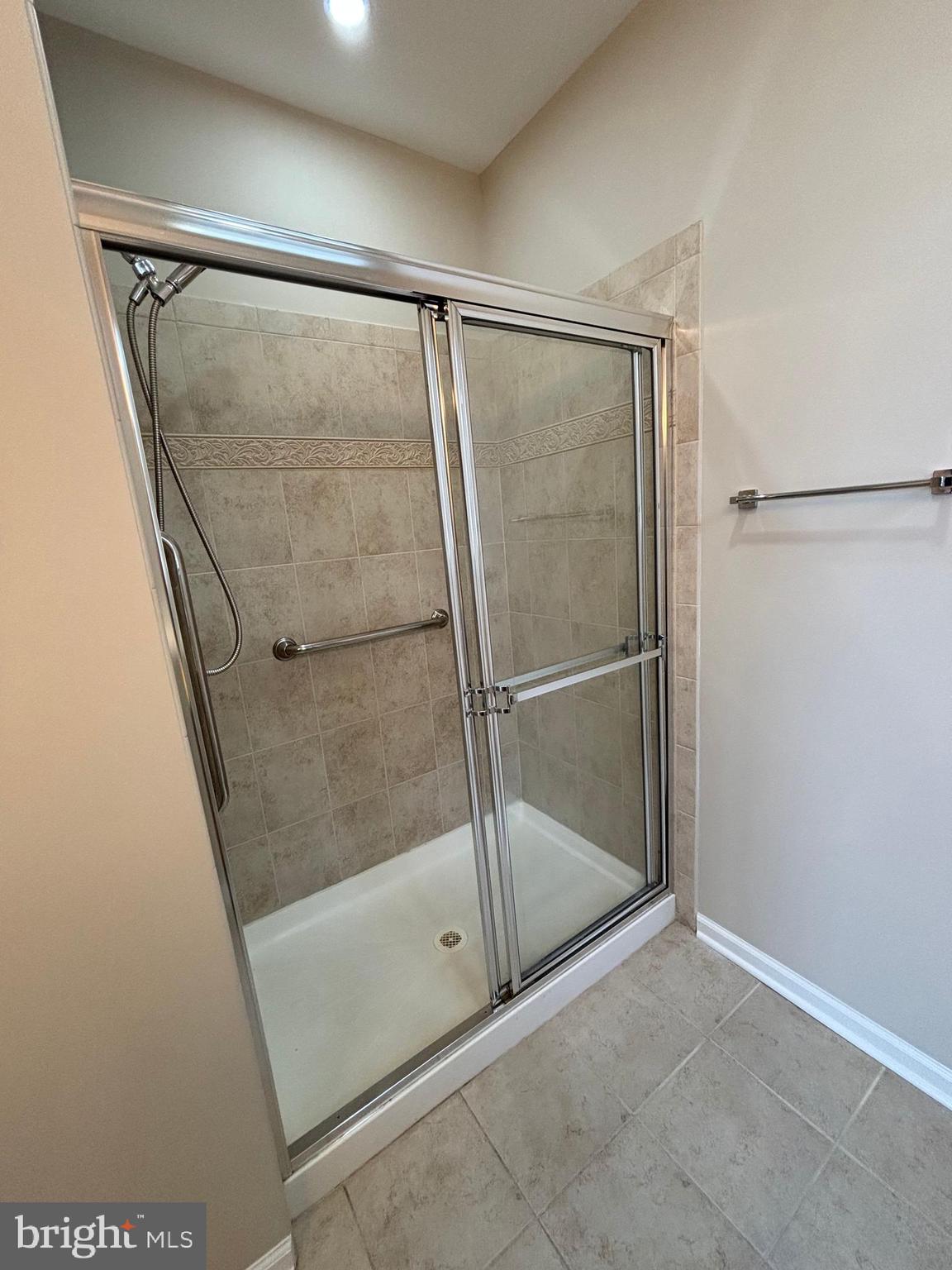1321 Sierra Drive Hamilton, NJ 08619 - Photo 25 of 33 a bathroom with a glass shower door