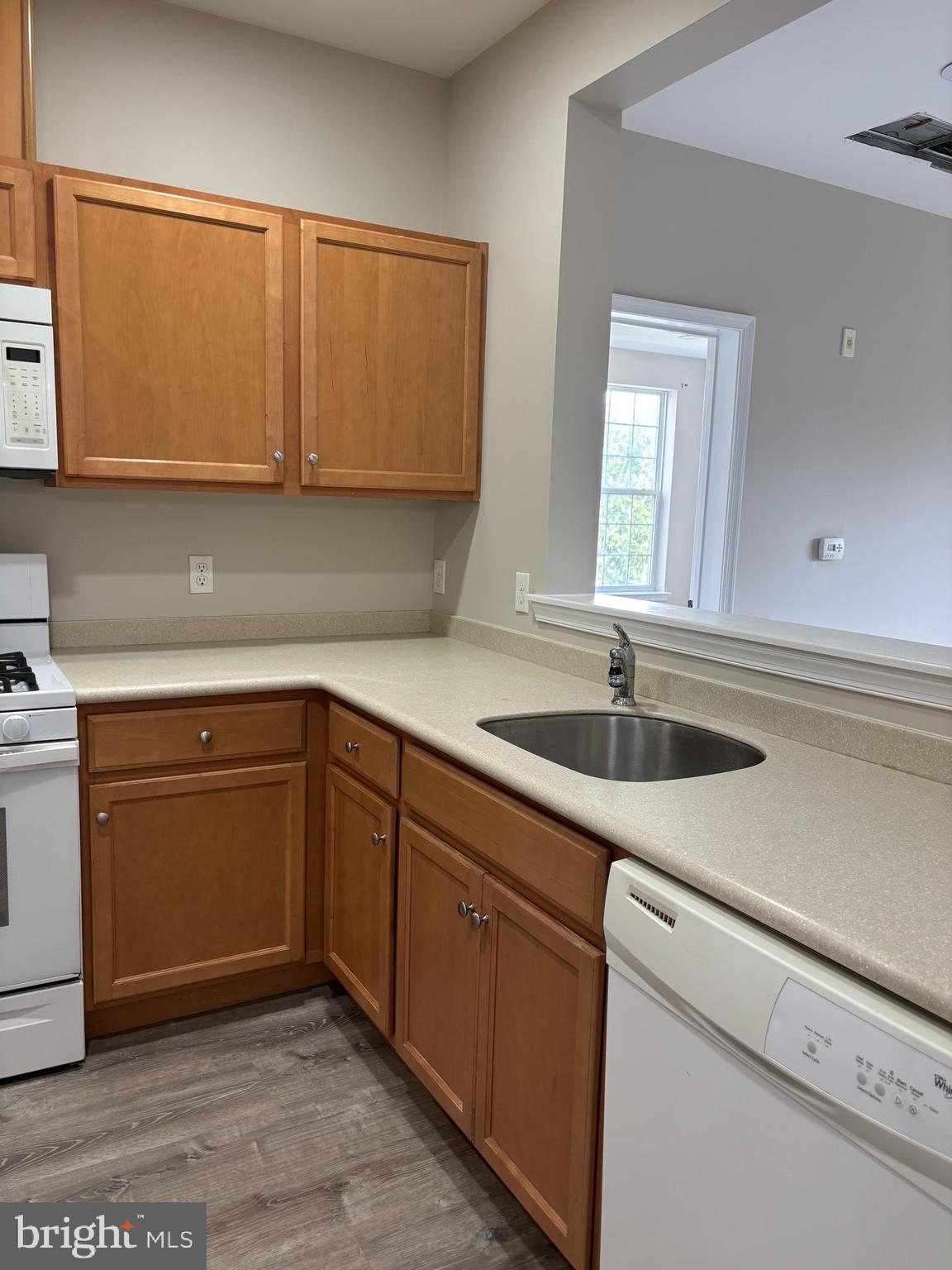 1321 Sierra Drive Hamilton, NJ 08619 - Photo 8 of 33 a kitchen with a sink cabinets and appliances