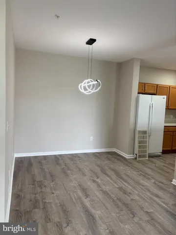 a spacious bathroom with a bathtub and a sink
