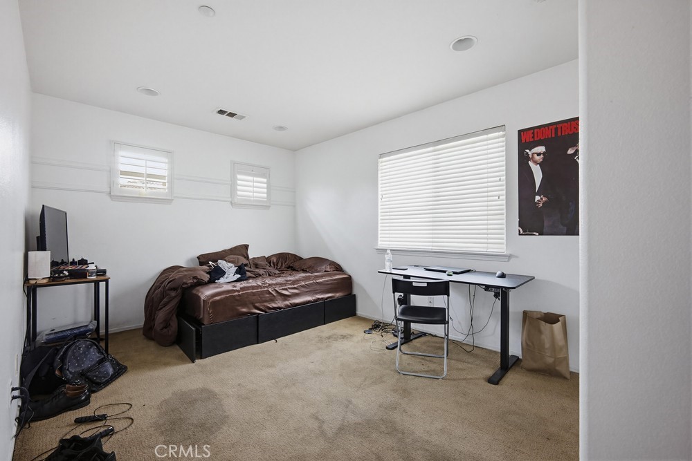 1747 Palermo Drive Riverside, CA 92507 - Photo 20 of 30 a bedroom with a workspace