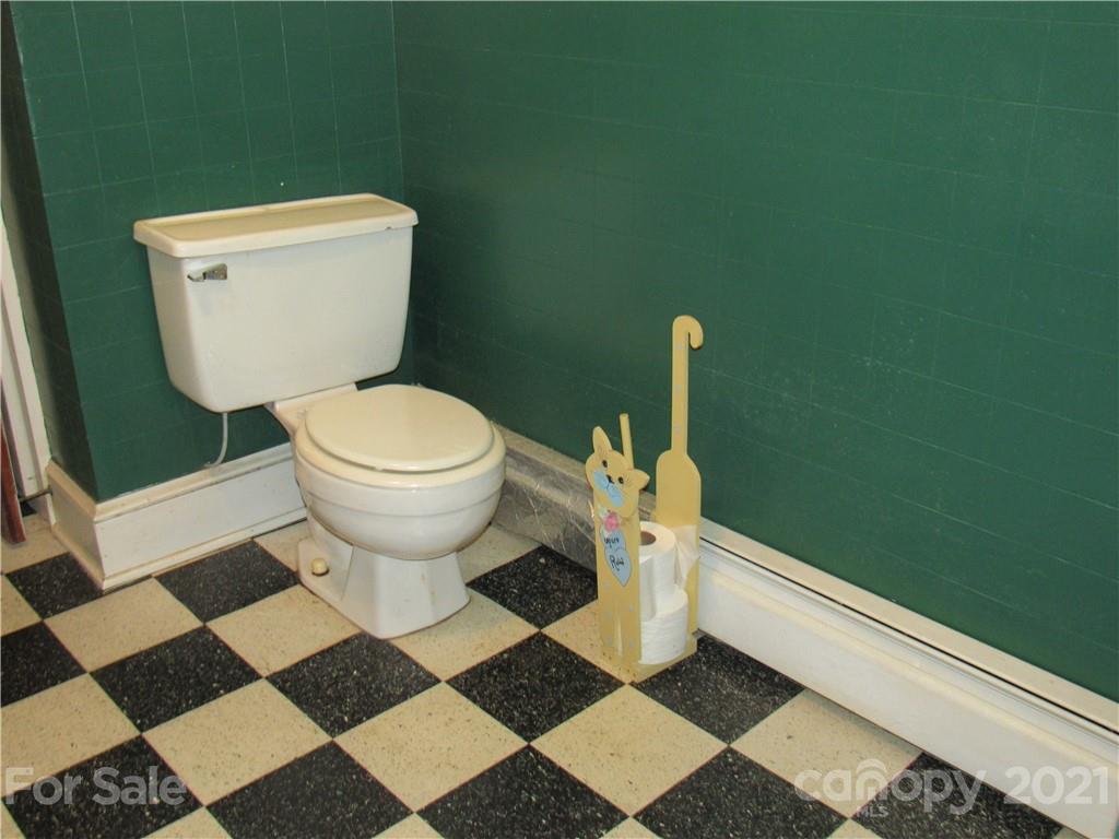 4740 Jack Brown Road Salisbury, NC 28147 - Photo 22 of 48 a bathroom with a toilet and a washing machine