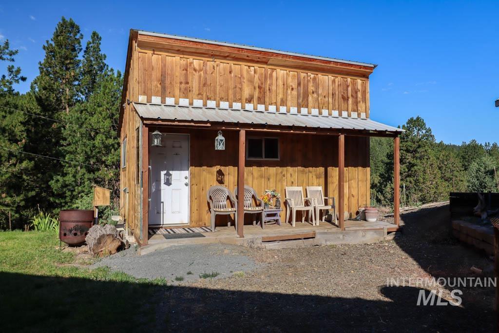 32290 Rice Road Unity, OR 97884 - Photo 41 of 45 Back of property featuring board and batten siding and a metal roof