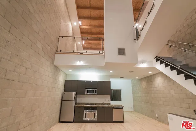 a view of a kitchen with a sink