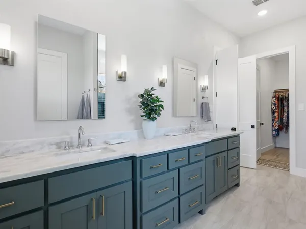 a bedroom with bed and window