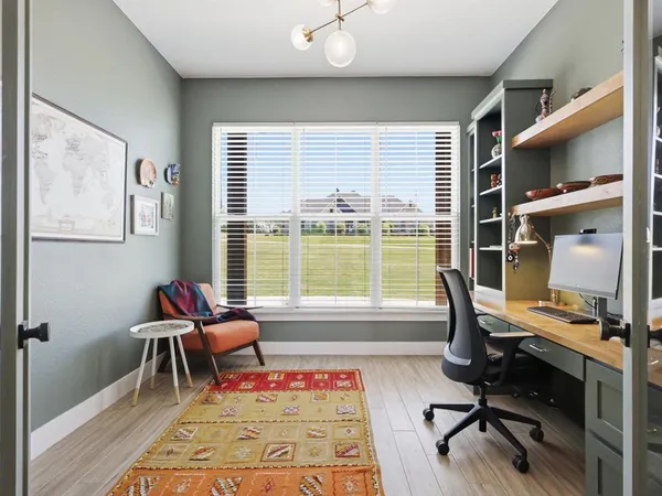 a view of storage and utility room with washer and dryer