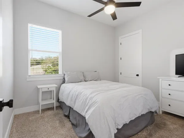 a view of a yard with a fence