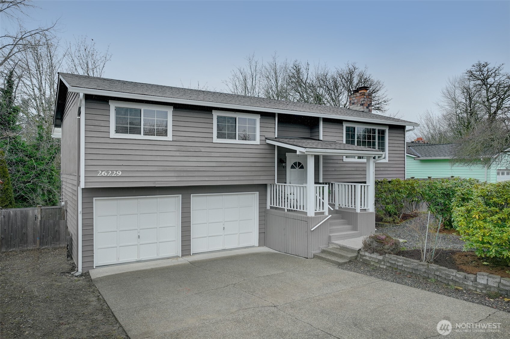 26229 197th Place Southeast Covington, WA 98042 - Photo 1 of 39 a front view of a house with a garage
