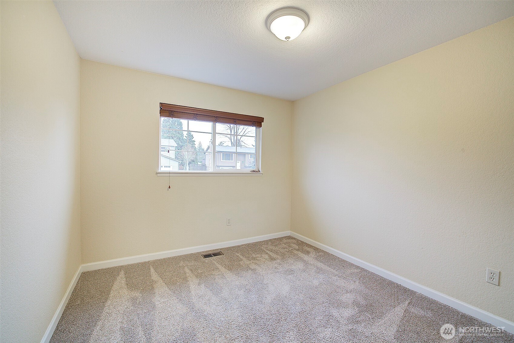 26229 197th Place Southeast Covington, WA 98042 - Photo 15 of 39 an empty room with a window