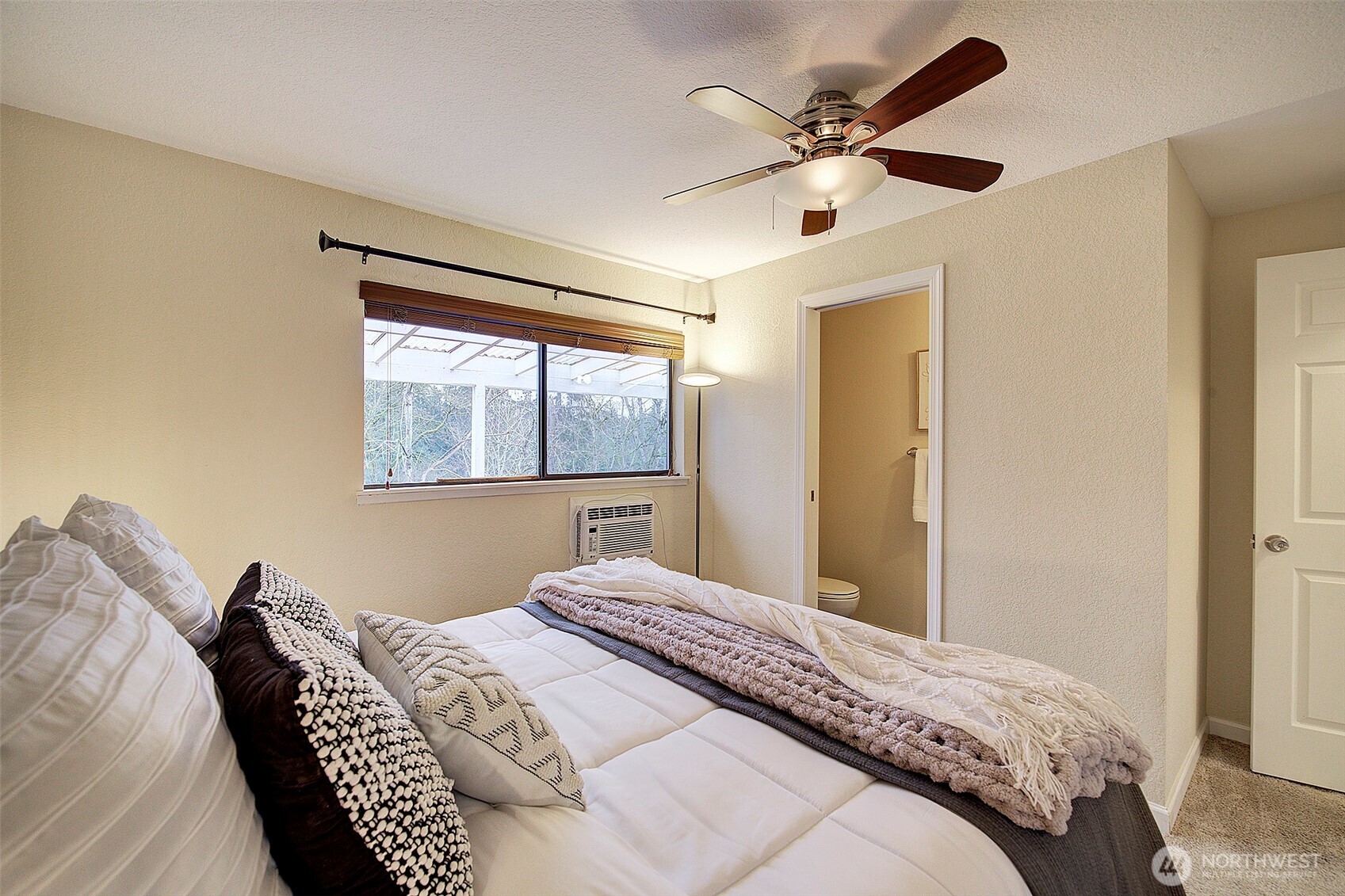 26229 197th Place Southeast Covington, WA 98042 - Photo 19 of 39 a bedroom with bed and window