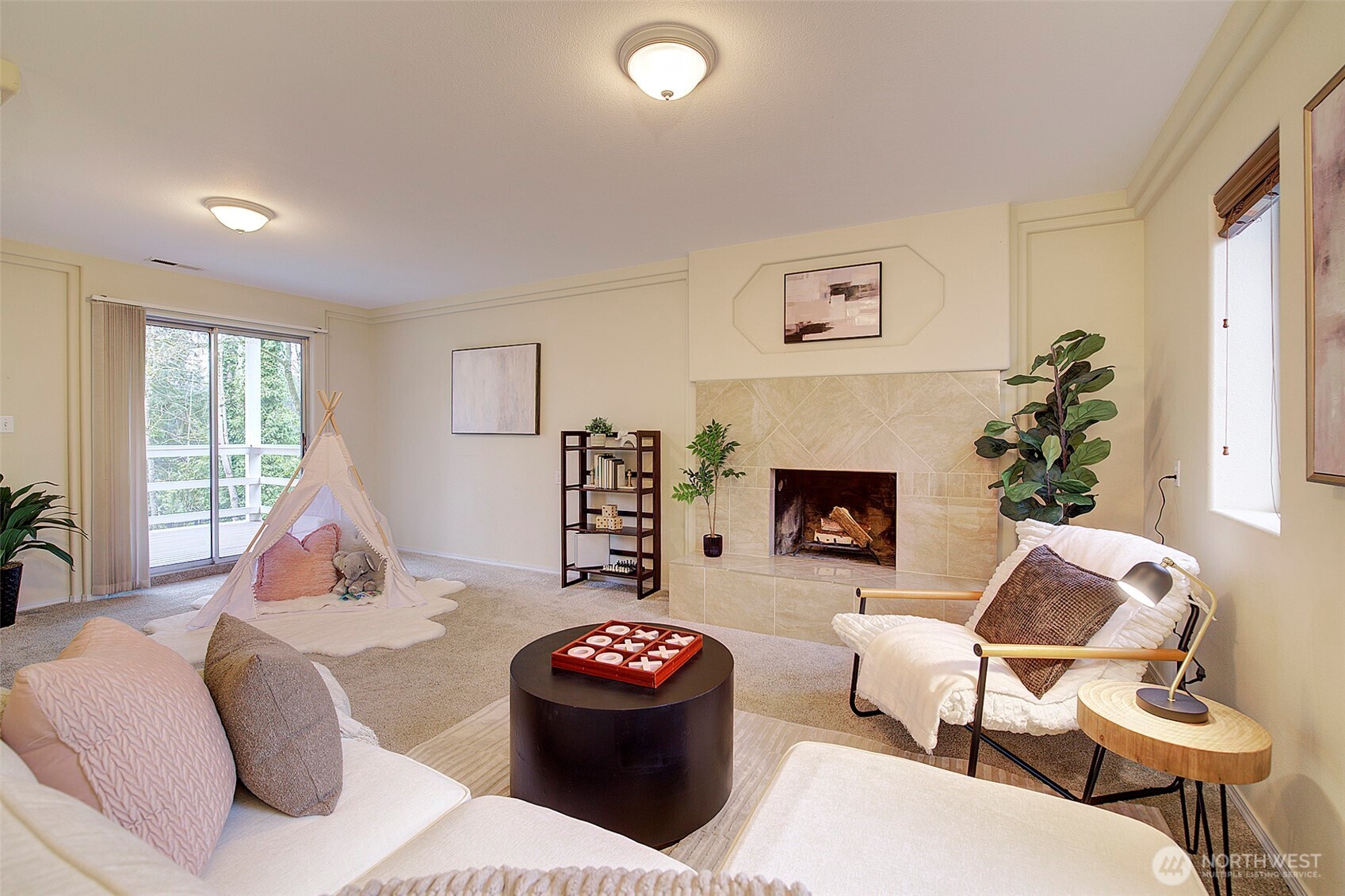 26229 197th Place Southeast Covington, WA 98042 - Photo 23 of 39 a living room with furniture and a fireplace