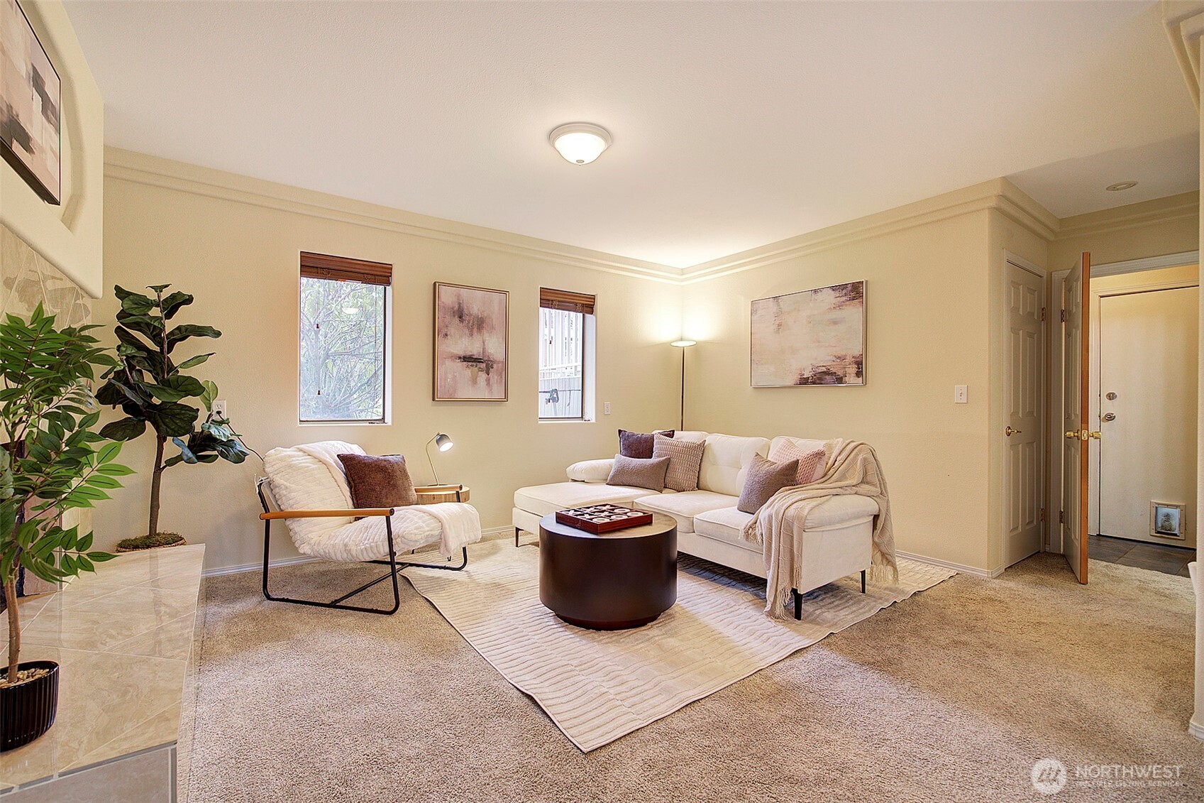 26229 197th Place Southeast Covington, WA 98042 - Photo 25 of 39 a living room with furniture and a potted plant