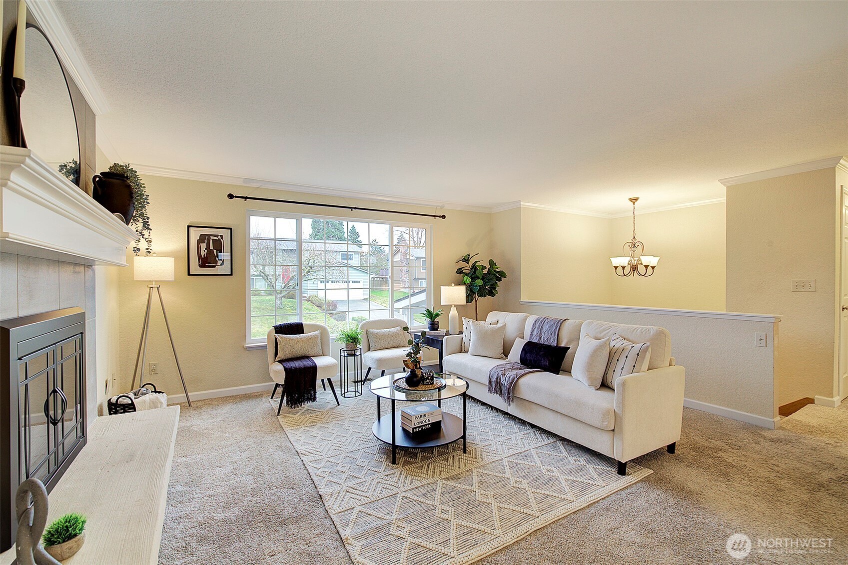 26229 197th Place Southeast Covington, WA 98042 - Photo 3 of 39 a living room with furniture and a fireplace
