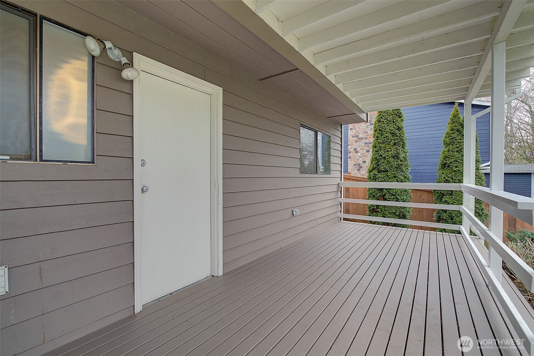 26229 197th Place Southeast Covington, WA 98042 - Photo 31 of 39 a view of balcony with wooden floor and fence
