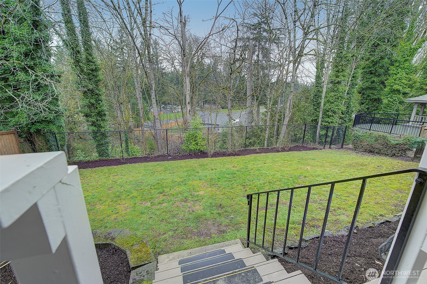 26229 197th Place Southeast Covington, WA 98042 - Photo 33 of 39 a view of a backyard with a garden