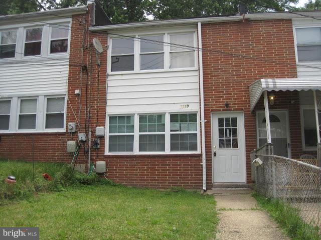 3319 Bero Road Halethorpe, MD 21227 - Photo 1 of 7 a view of front of a house with a yard