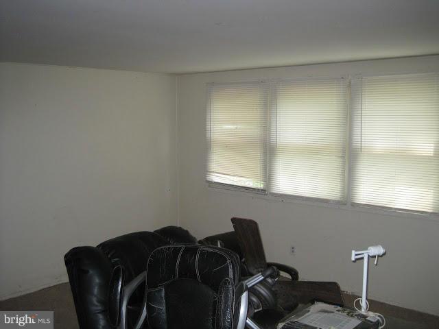 3319 Bero Road Halethorpe, MD 21227 - Photo 2 of 7 a view of a workspace with furniture and a window