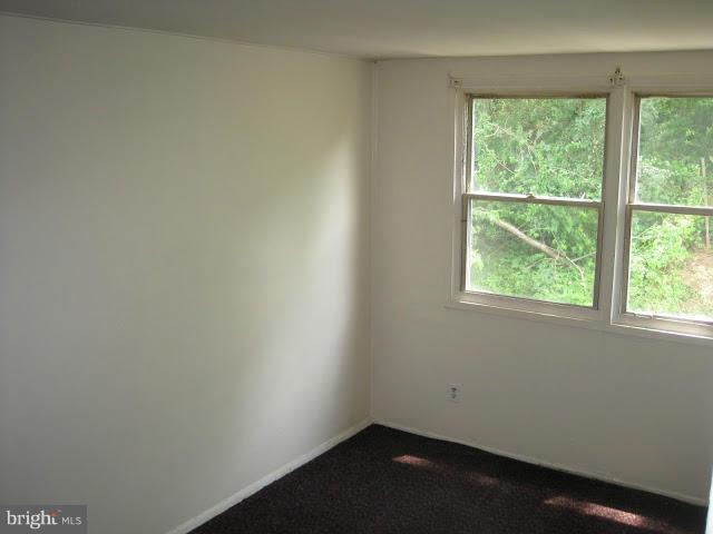 3319 Bero Road Halethorpe, MD 21227 - Photo 4 of 7 an empty room with a window