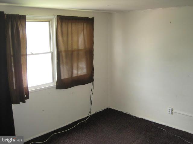 3319 Bero Road Halethorpe, MD 21227 - Photo 6 of 7 an empty room with windows