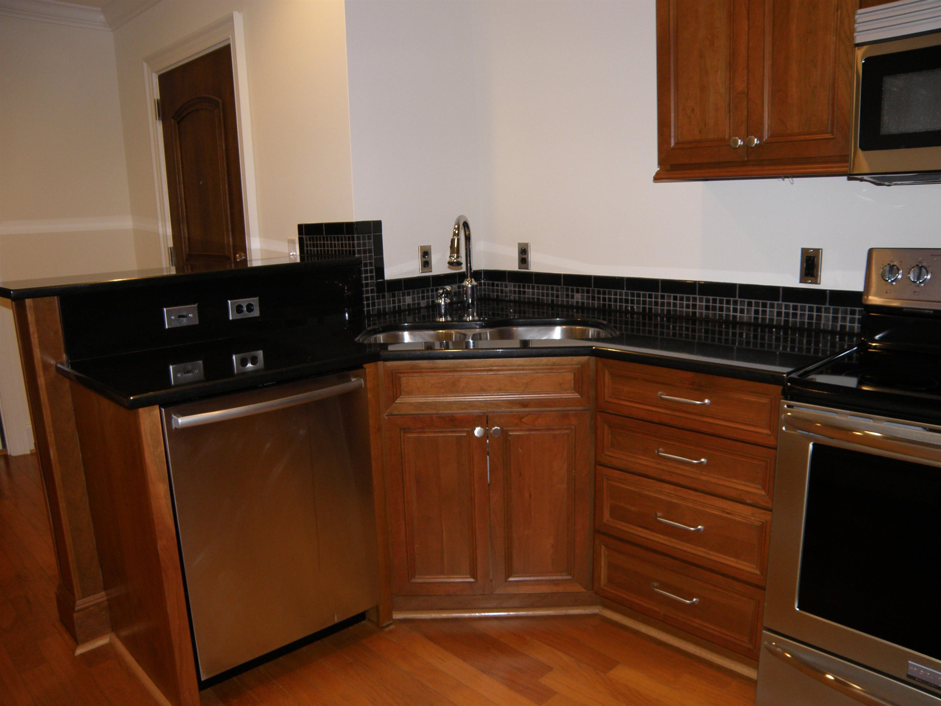 710 Independence Place, Unit 204 Raleigh, NC 27603 - Photo 9 of 27 Who doesn't love an efficient kitchen with high quality finishes and appliances. Kitchen