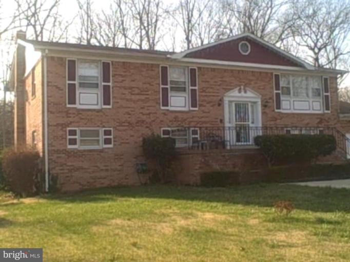 11801 Fort Washington Road Fort Washington, MD 20744 - Photo 2 of 6 a front view of a house with a yard