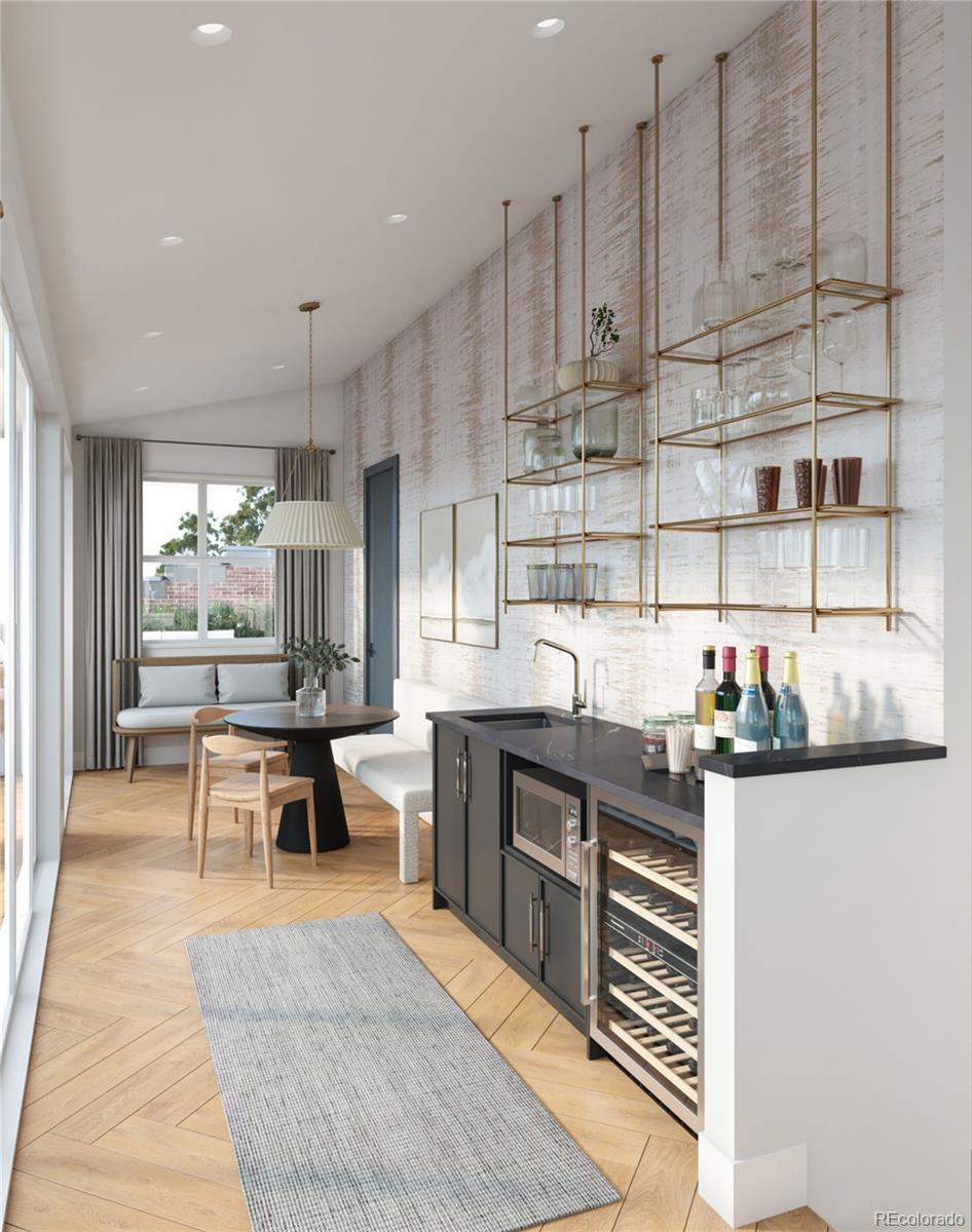 431 Acoma Street Denver, CO 80204 - Photo 10 of 18 a kitchen with stainless steel appliances kitchen island granite countertop a sink and cabinets