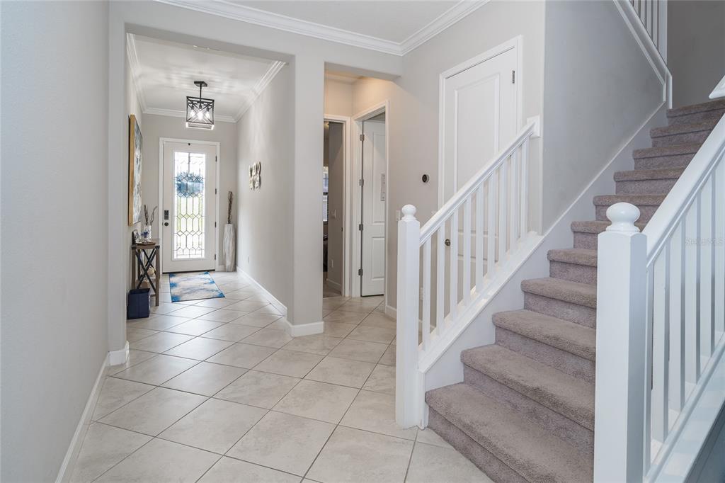 8099 Lago Mist Way Wesley Chapel, FL 33545 - Photo 12 of 56 a view of a hallway view with staircase