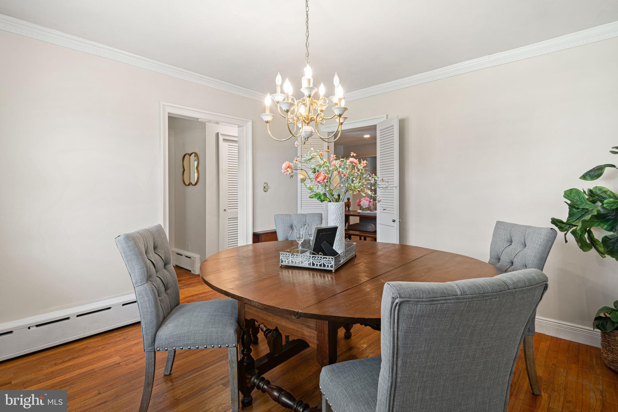 435 1st Avenue Haddon Heights, NJ 08035 - Photo 5 of 19 a view of a dining room with furniture and chandelier