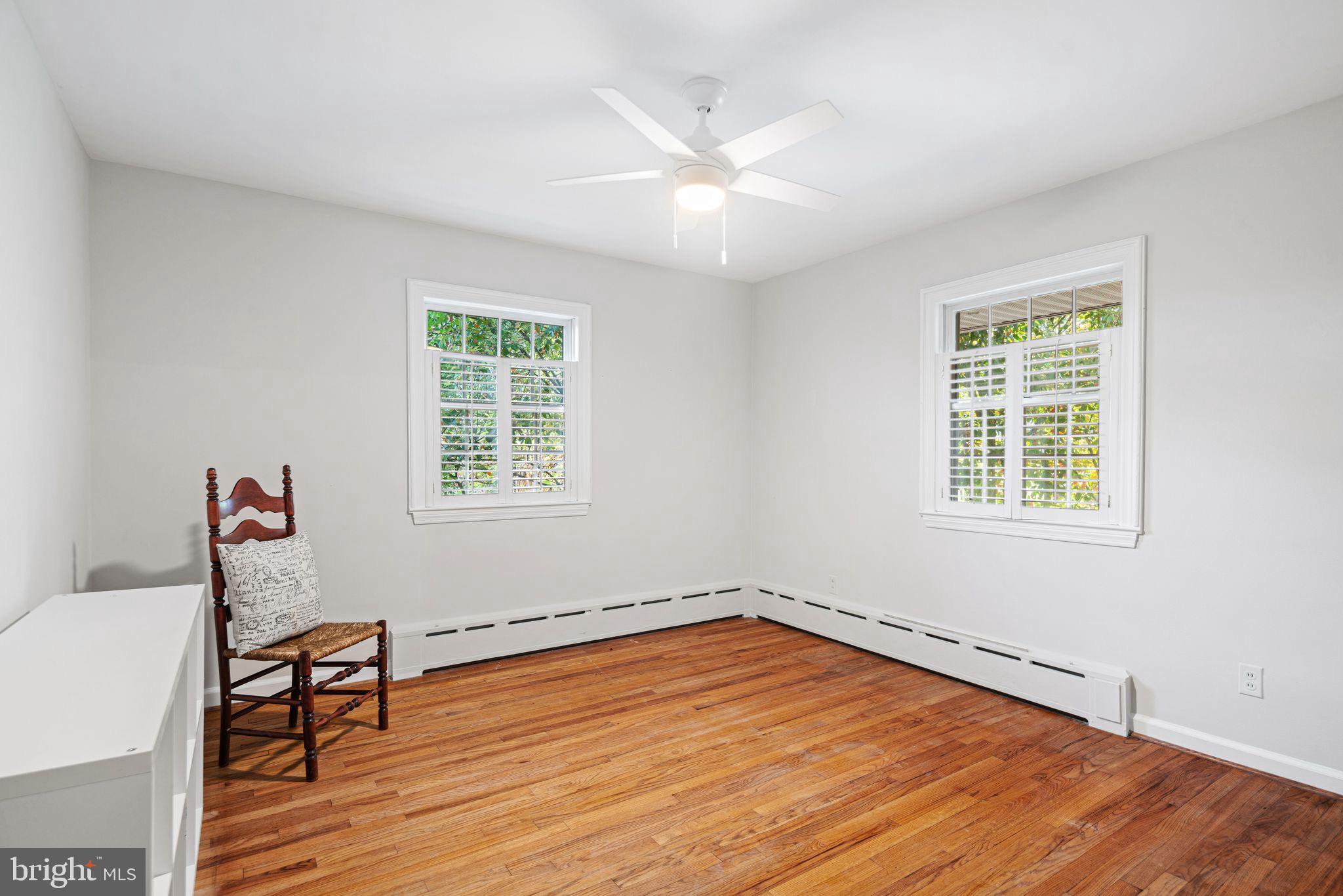 435 1st Avenue Haddon Heights, NJ 08035 - Photo 10 of 19 a view of a room with wooden floor and windows