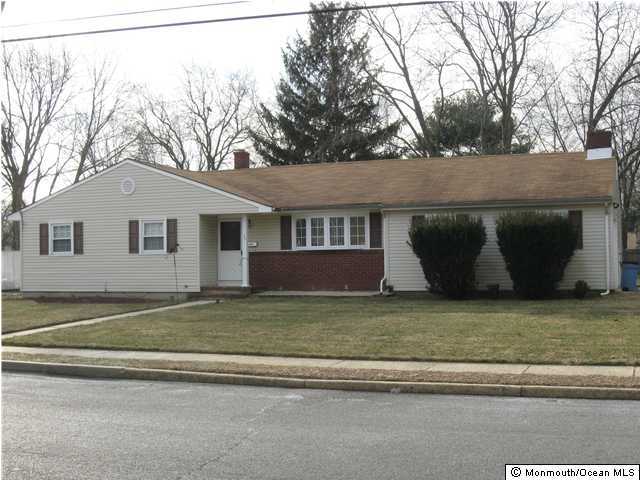 34 Lexington Road Howell, NJ 07731 - Photo 1 of 3 a view of a house with a yard