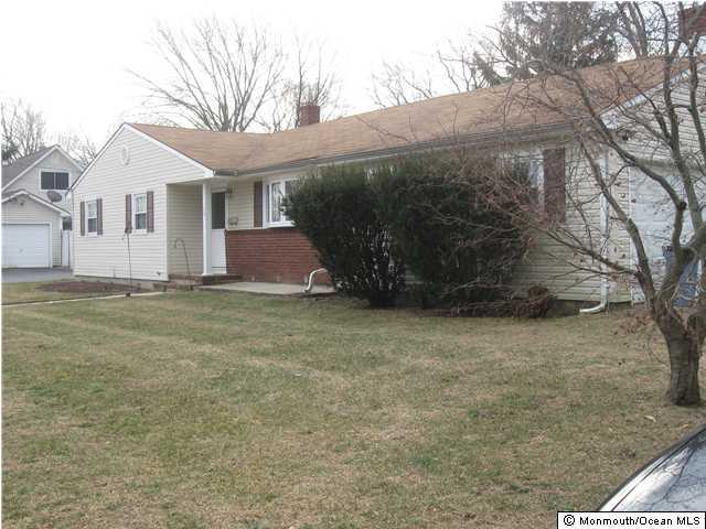 34 Lexington Road Howell, NJ 07731 - Photo 2 of 3 a view of a house with a yard