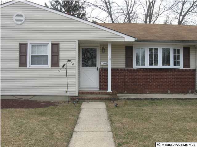 34 Lexington Road Howell, NJ 07731 - Photo 3 of 3 a view of a house with backyard