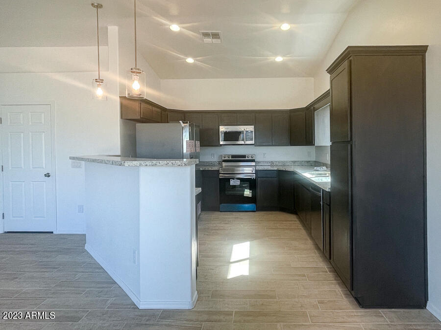 1796 Salvador Court, Unit 46 Rio Rico, AZ 85648 - Photo 6 of 18 1796 Salvador-Kitchen-App-4-20-23