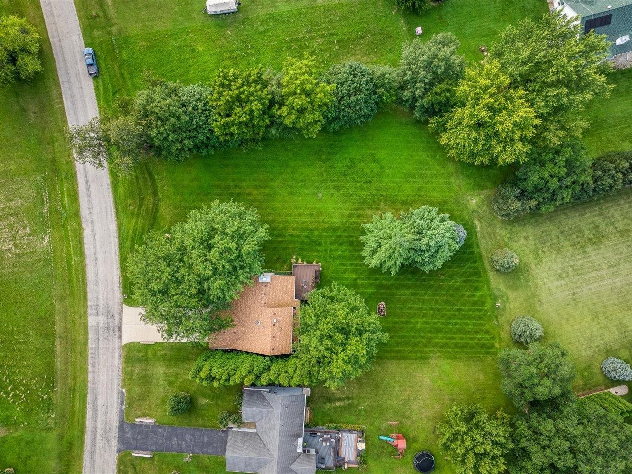 1645 Larchmont Road Davis, IL 61019 - Photo 2 of 2 a lush green forest with lots of trees