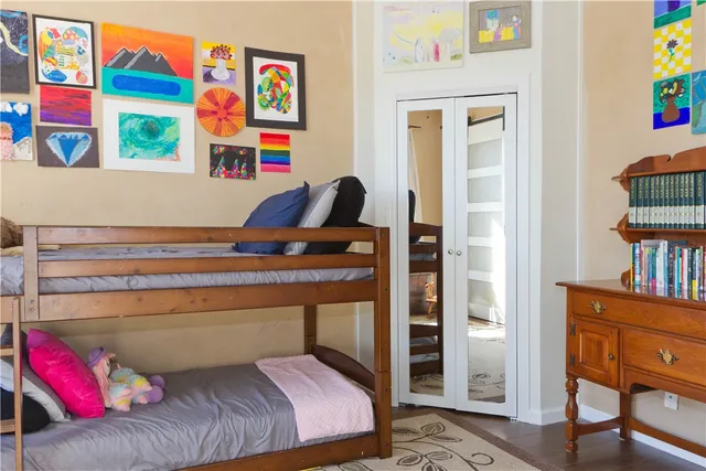 a bedroom with a bed and furniture