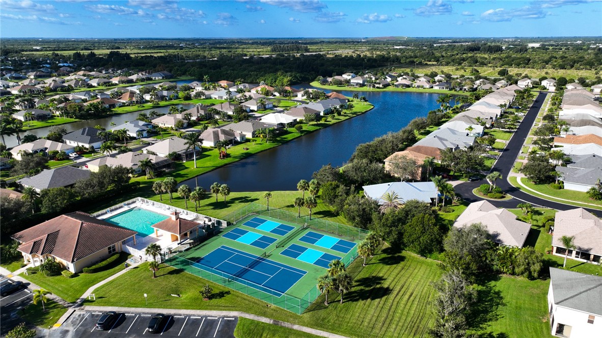 628 Tangelo Circle Southwest Vero Beach, FL 32968 - Photo 29 of 36 an aerial view of residential houses with outdoor space