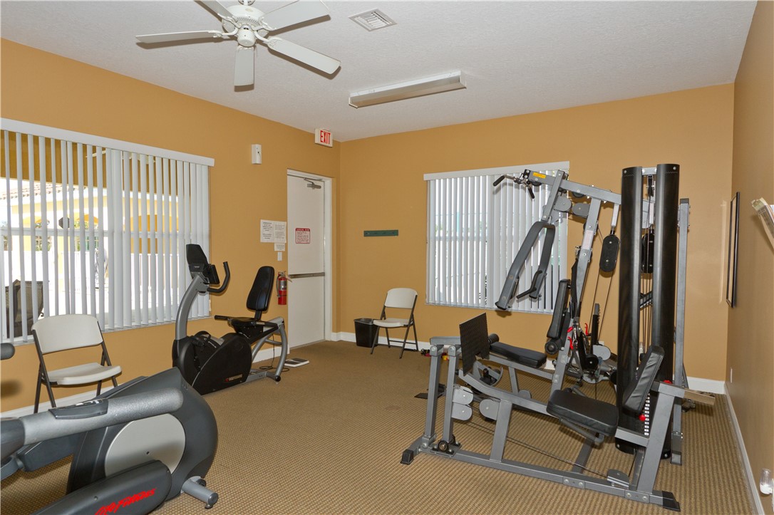 628 Tangelo Circle Southwest Vero Beach, FL 32968 - Photo 31 of 36 a view of a room with gym equipment