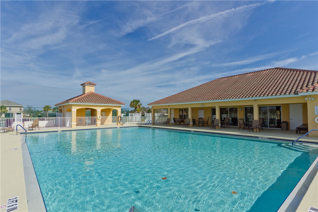 628 Tangelo Circle Southwest Vero Beach, FL 32968 - Photo 32 of 36 a front view of a house with a yard