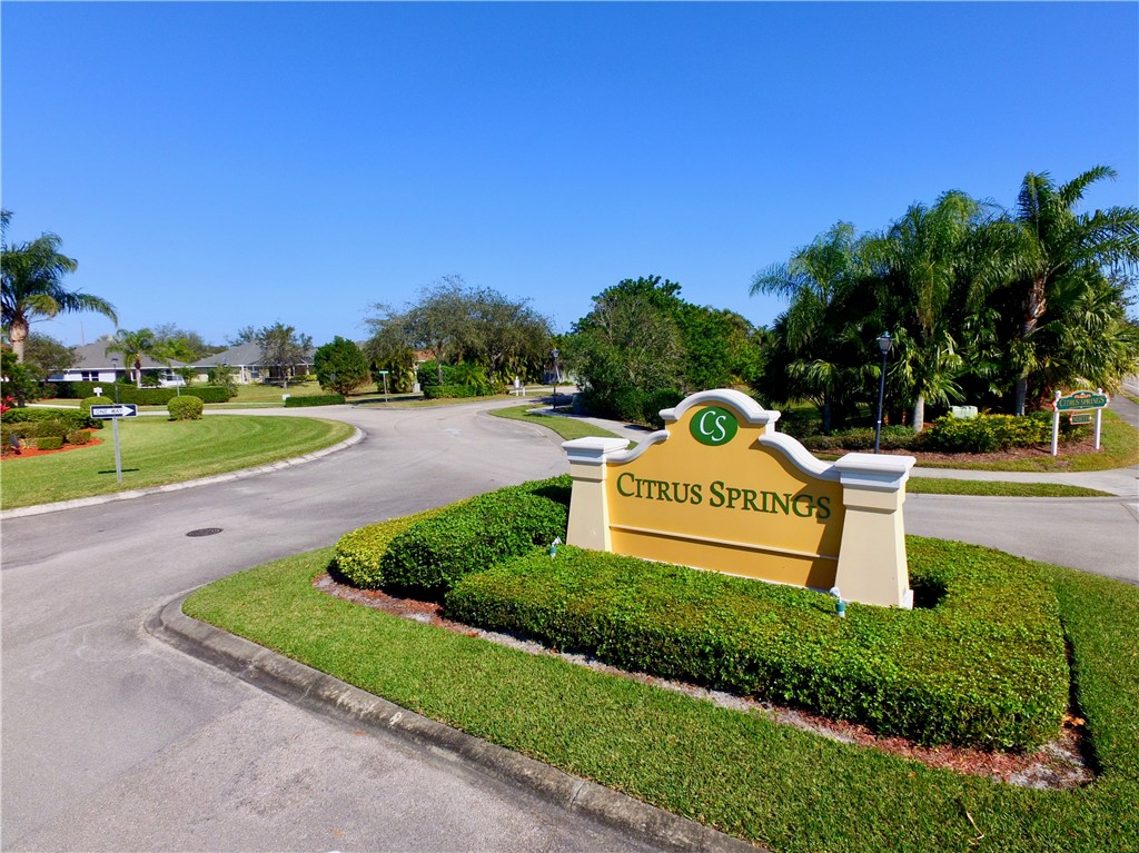 628 Tangelo Circle Southwest Vero Beach, FL 32968 - Photo 36 of 36 a white bench sitting in the middle of a park