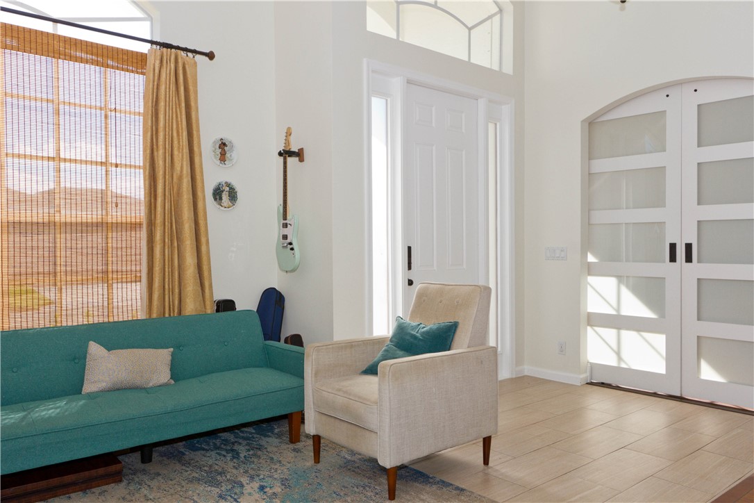 628 Tangelo Circle Southwest Vero Beach, FL 32968 - Photo 7 of 36 a living room with furniture and a large window