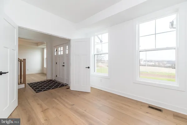 a kitchen with a sink cabinets and window