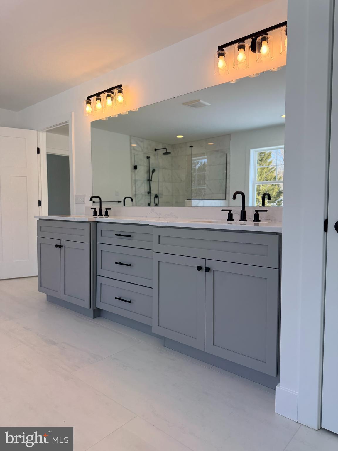 209 Old State Road Royersford, PA 19468 - Photo 21 of 29 a bathroom with a sink and a mirror