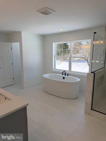 a view of a bathtub in a room