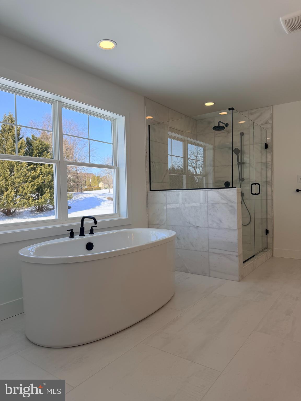 209 Old State Road Royersford, PA 19468 - Photo 24 of 29 a bath tub sitting in a bathroom next to a window