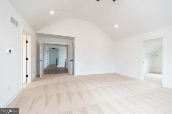a view of an empty room and window