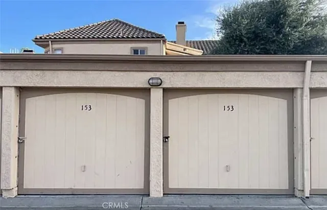 a view of a room with wooden walls