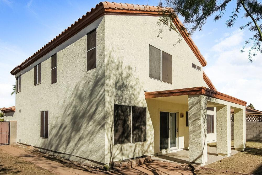 9243 West St John Road Peoria, AZ 85382 - Photo 16 of 17 a view of a house with a iron stairs
