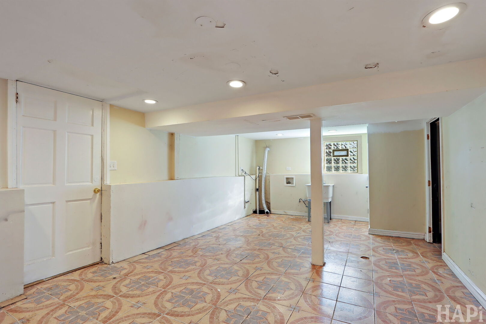 619 North Butrick Street Waukegan, IL 60085 - Photo 14 of 20 a view of a big room with closet and windows