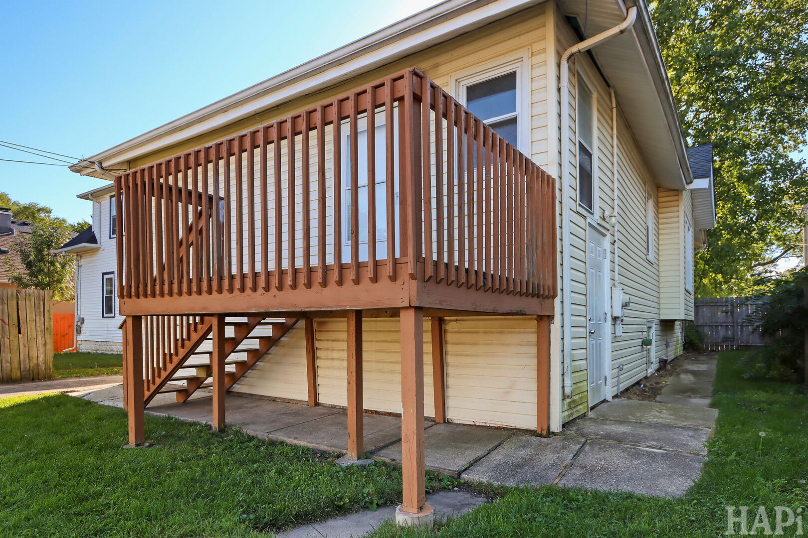619 North Butrick Street Waukegan, IL 60085 - Photo 19 of 20 a view of a small house with a deck