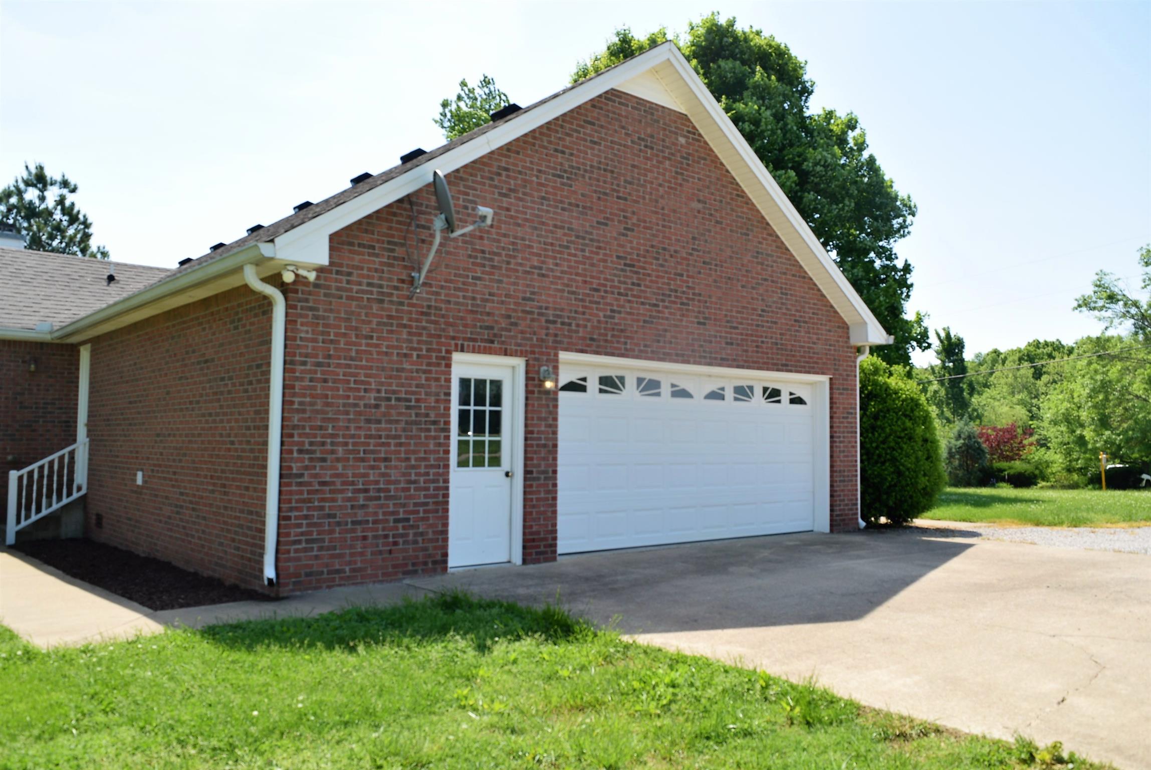 4893 Albright Road Clarksville, TN 37043 - Photo 2 of 20 Two car attached garage with large concrete pad!