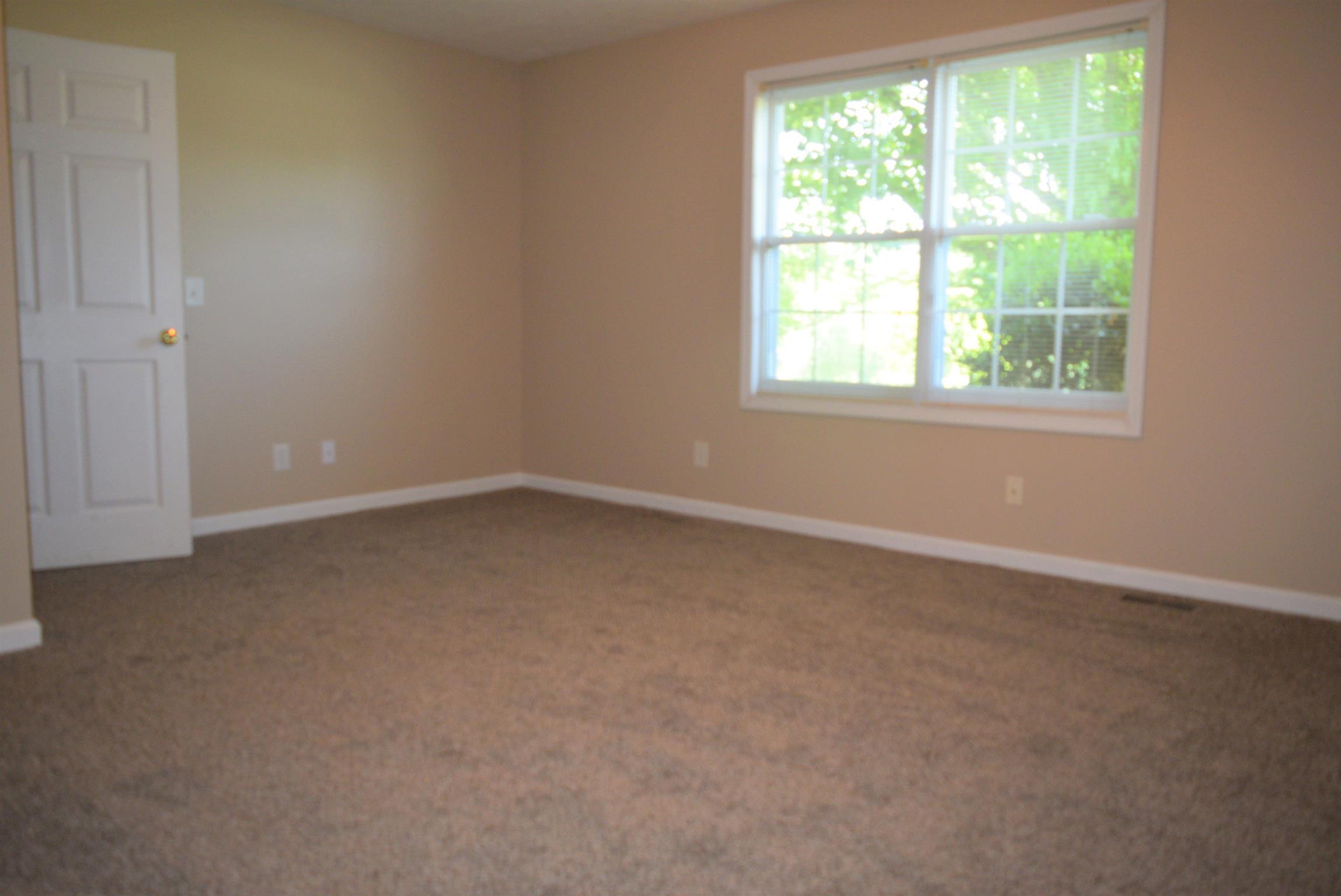 4893 Albright Road Clarksville, TN 37043 - Photo 11 of 20 The master bedroom measures 13x17 and features a walk-in closet.